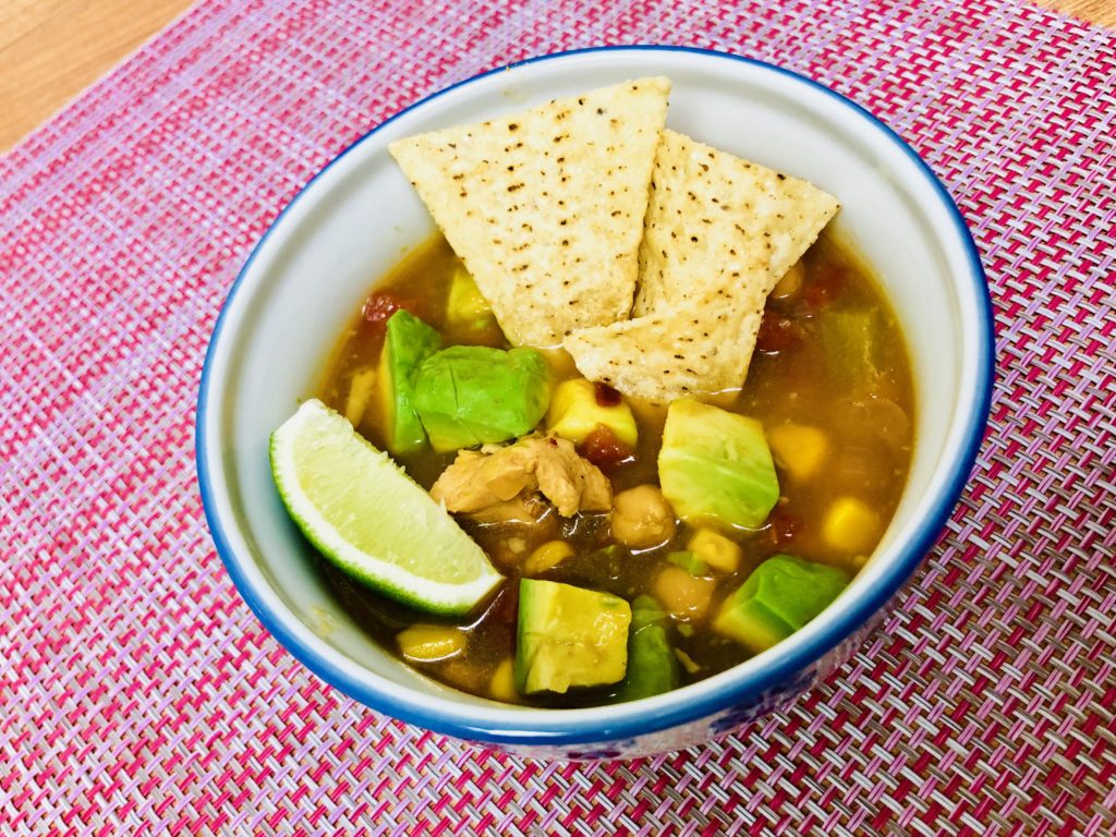 slow cooker chicken tortilla soup - a deliciously comforting and healthy slow cooker soup with Mexican flavors. #souprecipes #healthyeating #slowcookerrecipes #crockpotrecipes | Tiger USA