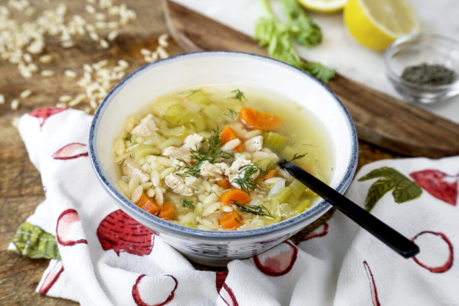 Bowl of chicken orzo and lemon soup